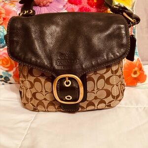 Coach Black leather bag with brown signature canvas.